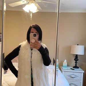 Womens size large faux fur shell with a polyester lining